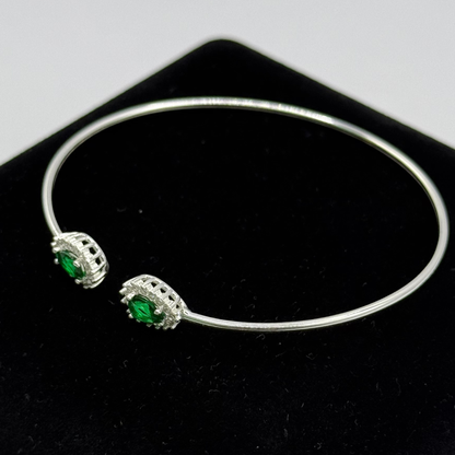 GREEN OVAL STONE WITH CZ DIAMONDS ON SILVER BANGLE Oppulence