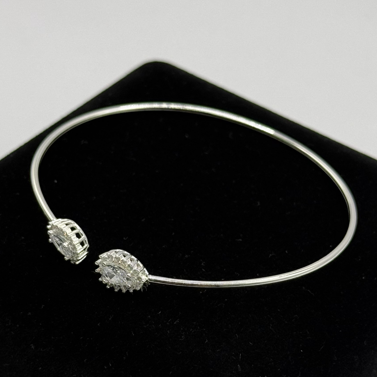 OVAL CZ DIAMOND ON SILVER BANGLE Oppulence