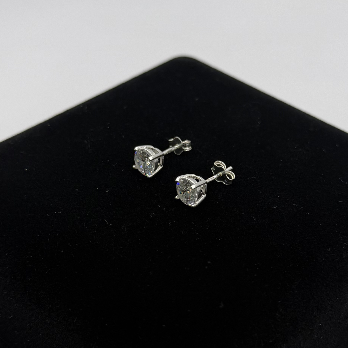 CZ DIAMOND CLAW EARRINGS Oppulence