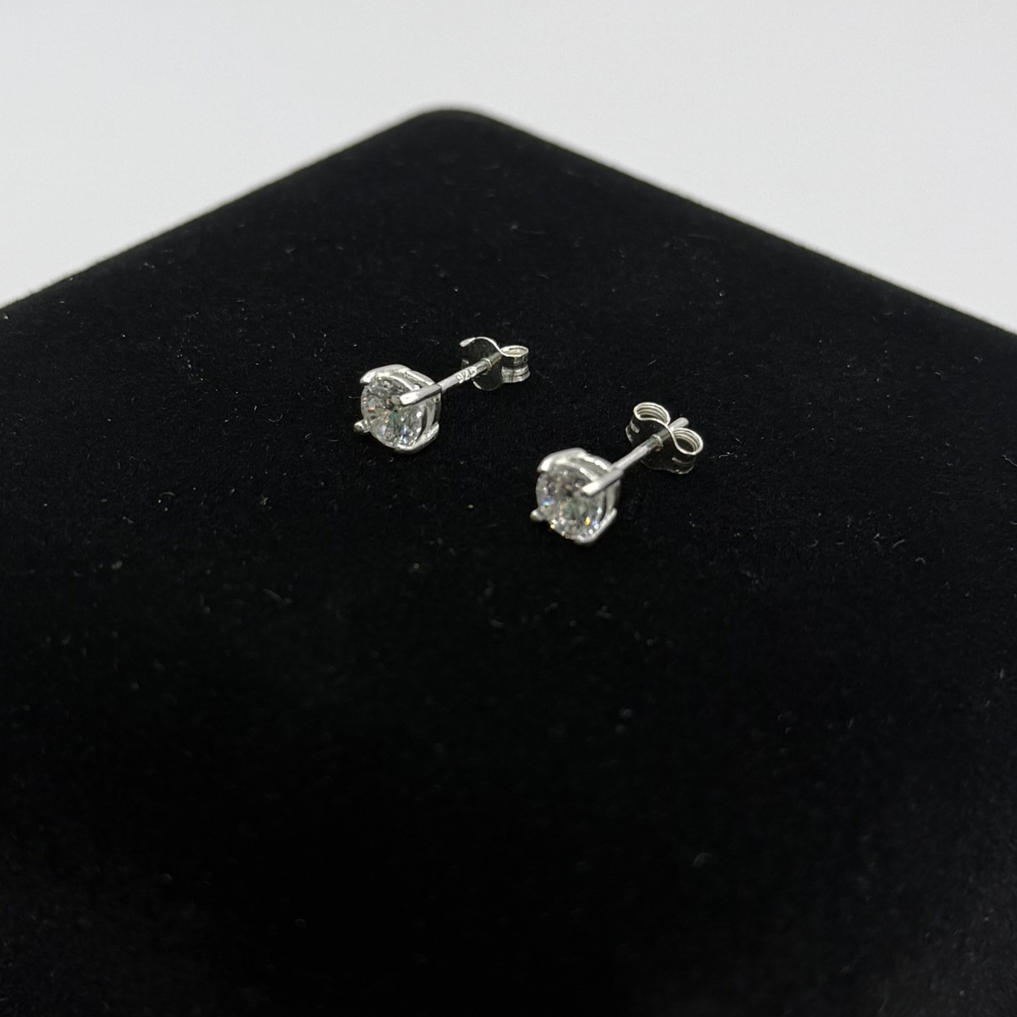 CZ DIAMOND CLAW EARRINGS Oppulence