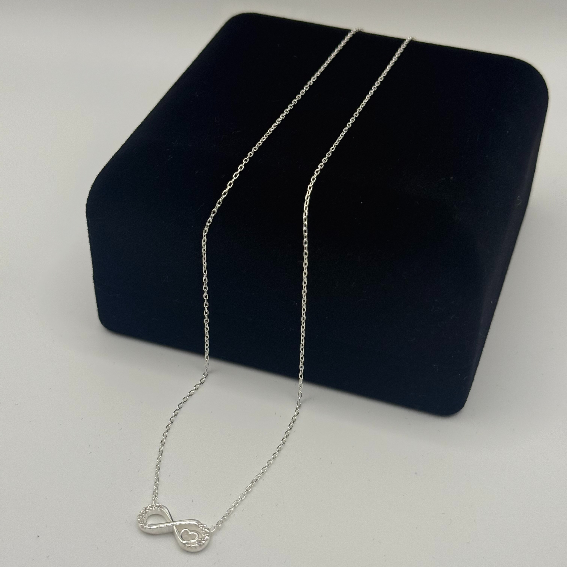 CZ INFINITY HEART NECKLACE Oppulence