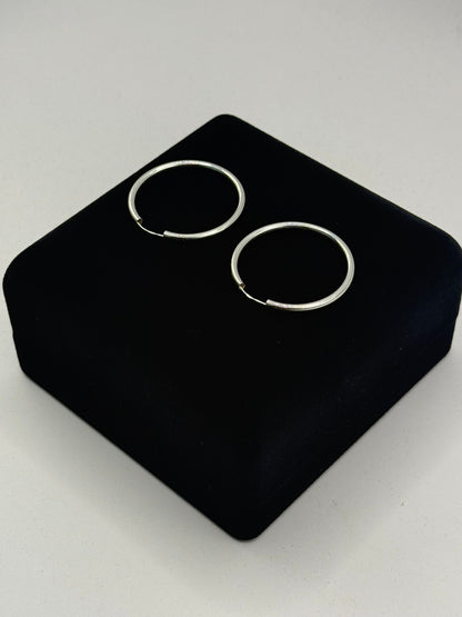 SILVER HOOP EARRINGS Oppulence