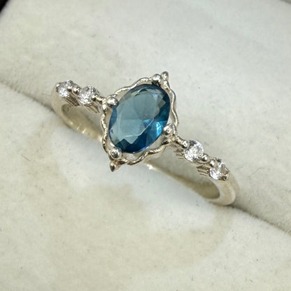 TIFFANY BLUE OPAL CZ DIAMOND STUD RING Oppulence